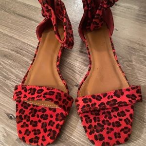 Never worn, size 10, black/red